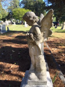 side view angel with bouquet